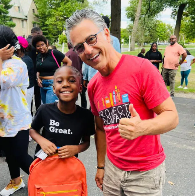 Mike Morse with a student at Project Backpack