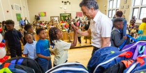 project backpack with Mike Morse and kids at school