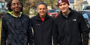 Mike Morse with two young guys that just got helped with building their house