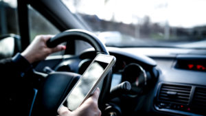 Texting and driving can cause car accidents and may put you in need of a lawyer