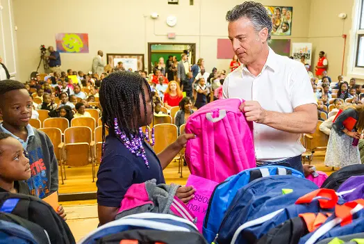 Mike with children and backpacks